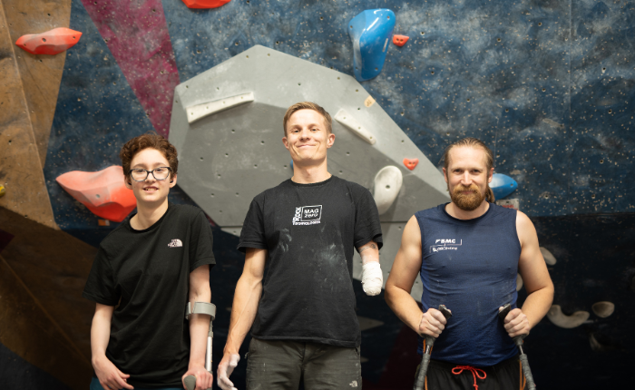3 members of the paraclimbing social stand for a group shot.